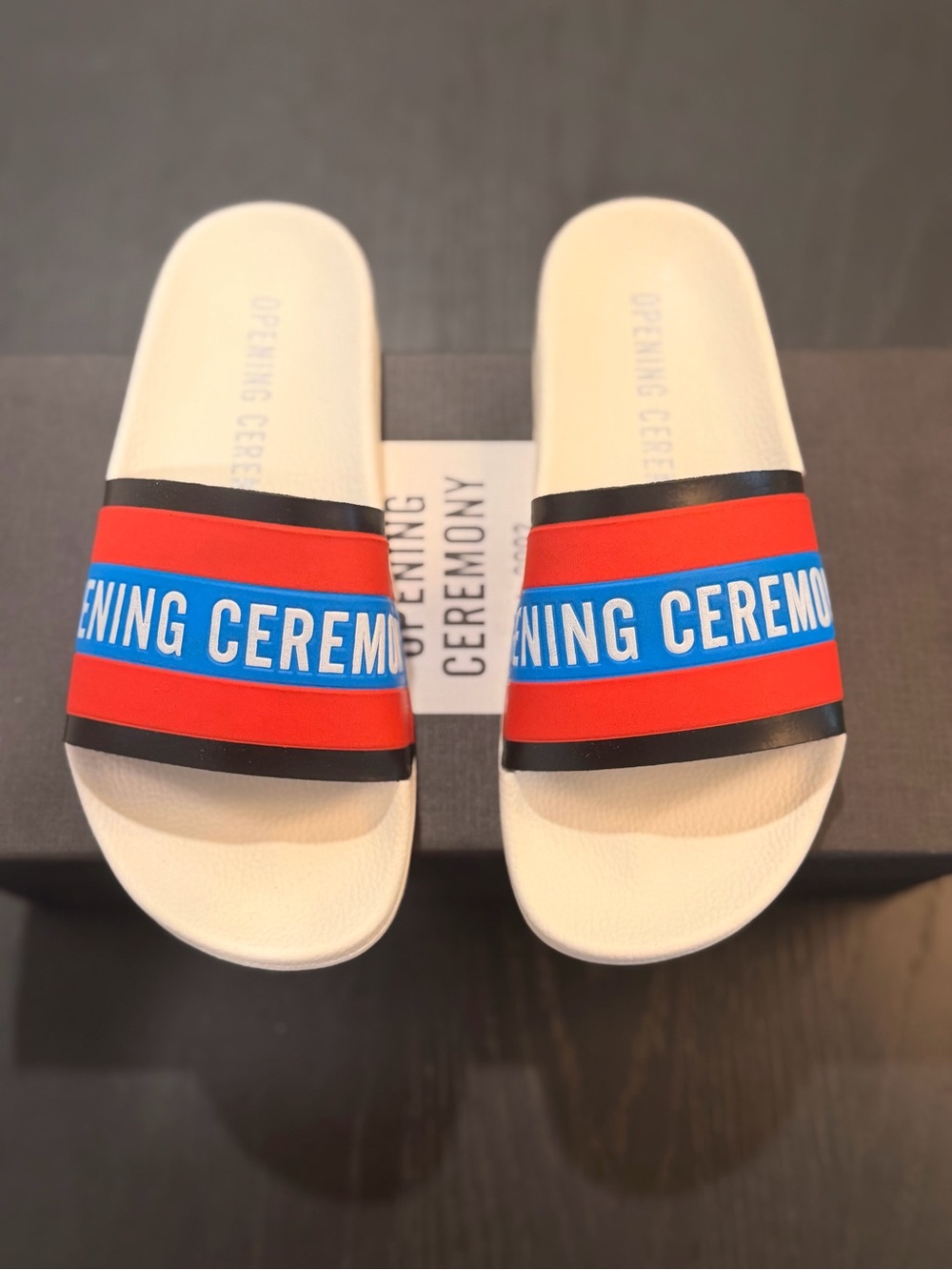 Opening Ceremony White Slides with Red and Blue Logo Straps